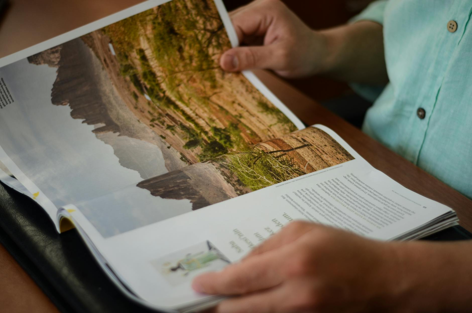 person reading magazine