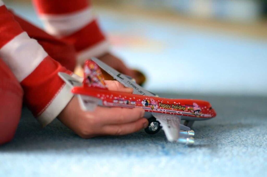 kid and toy